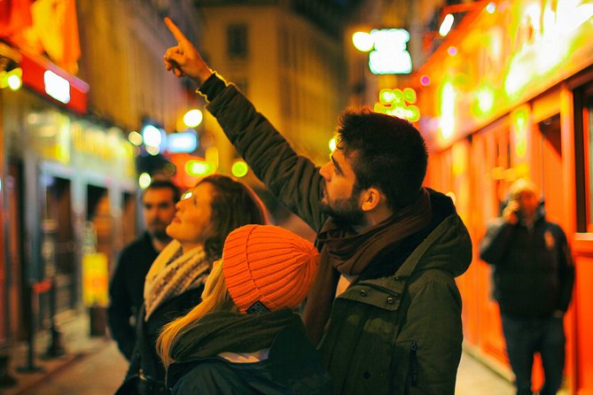 A Magical Evening in Paris With Locals: PRIVATE City Walking Tour - Seine riverbank walking: where the bridges become the main event
