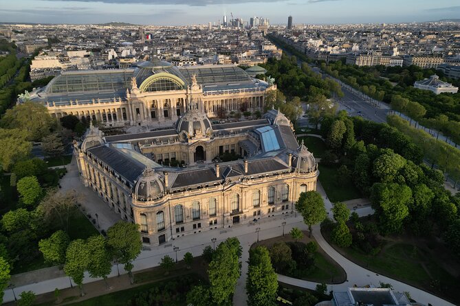 Arc de Triomphe and Champs Élysées Walking Tour - Price and value: $60.07 for a guided, mostly free-sights loop