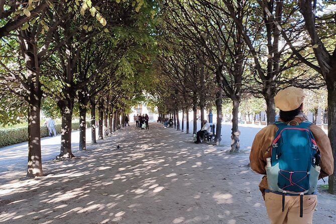 Best Bits of Paris: 40 Favorites Small-Group Walking & Metro Tour - Notre-Dame exterior, the Seine crossing, and Hotel de Ville contrasts