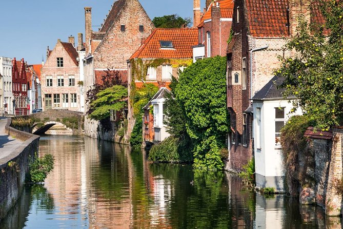 Bruges Guided Day Tour from Paris with Canal Cruise - Markt, the Belfry, and where to chase Belgian fries