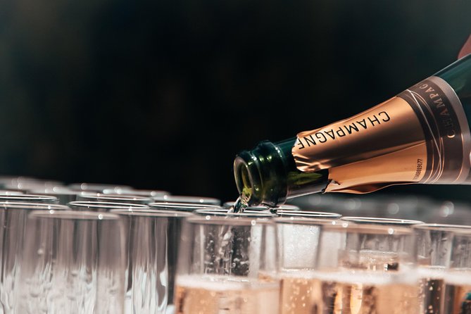 Champagne Private VIP Wine Day Trip with Michelin Lunch - Epernay boutique winery visit: rarer bottles and a different pace
