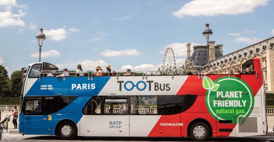Disneyland Paris: Bus Sightseeing Tour in Paris - Eiffel Tower Arrival: Your Photo Stop and Your Best Timing Play