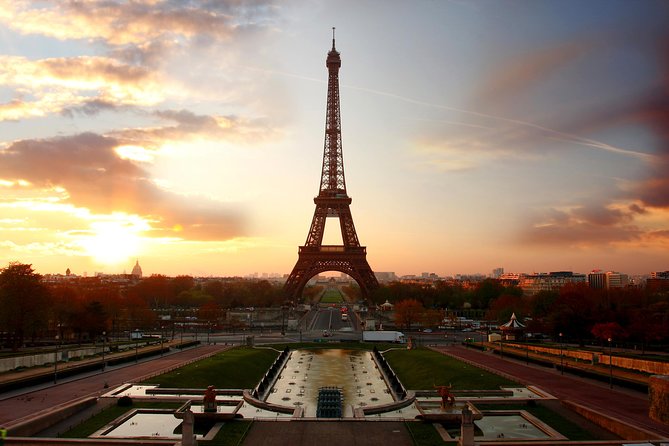 Eiffel Tower Tour with Optional Summit and Seine River Cruise - Stop 1 at the Base: Stories That Make the Tower Click