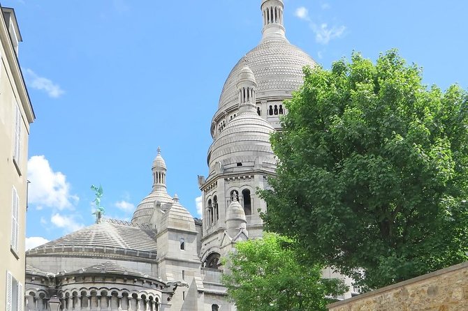 Explore Montmartre like a local - Private walking tour - Where locals actually spend time: shops, friends, and everyday Montmartre