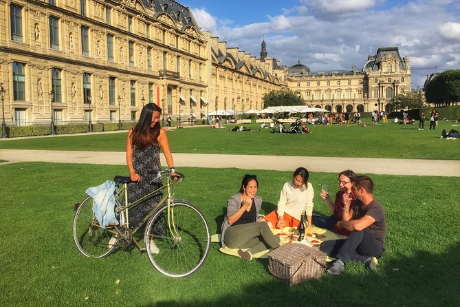 First Day Bike Tour, Top Sights, hidden gems, Wine&Cheese picnic - Le Marais and Place des Vosges: old Paris blocks and the picnic payoff