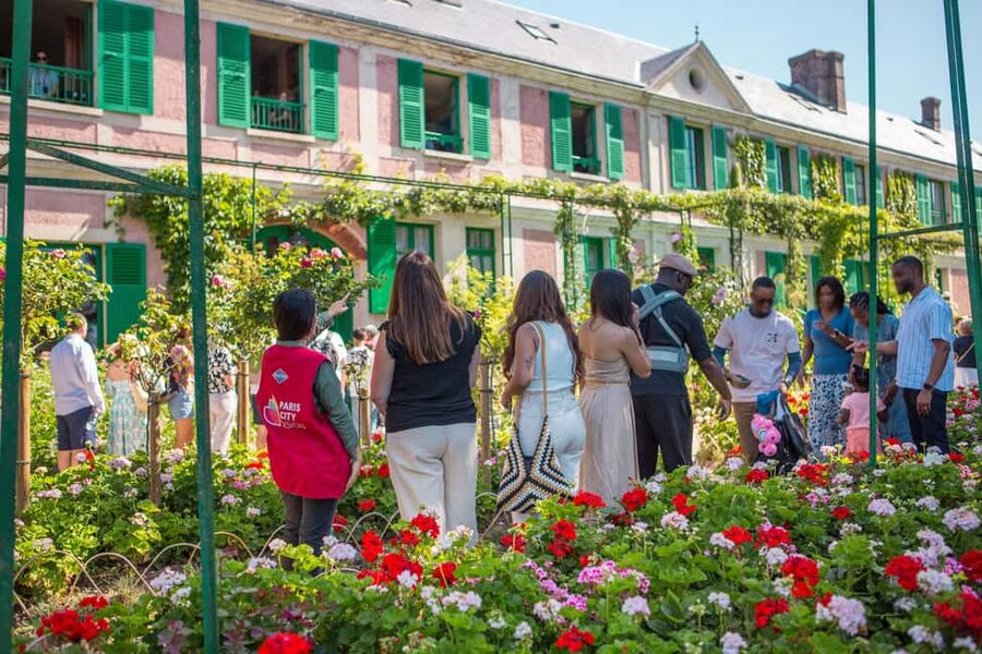 From Paris: Giverny Audio-Guided Tour - Clos Normand flower beds: color that keeps moving with you