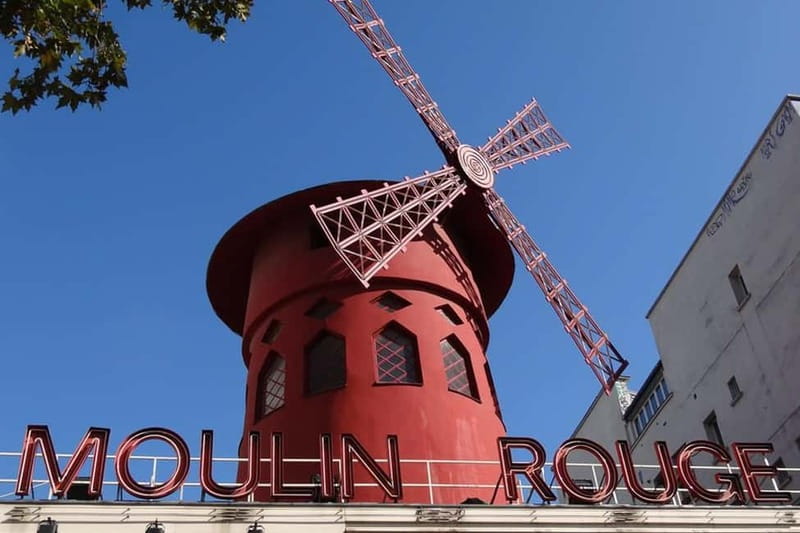 German private Walking Tour through Montmartre & Passages - Sacré-Cœur Basilica, a viewpoint with a backstory