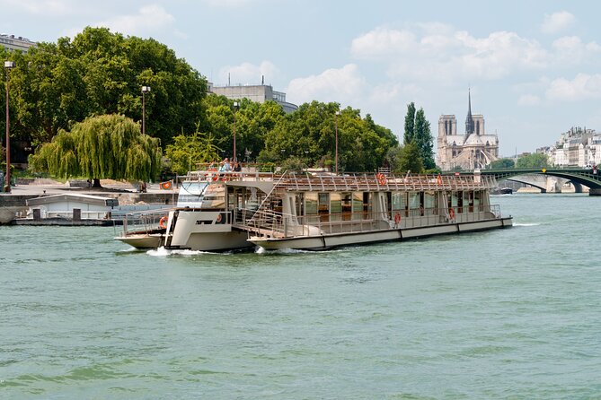 Louvre Access with a Multilingual Host - Seine cruise near the Eiffel Tower: one hour with audio commentary