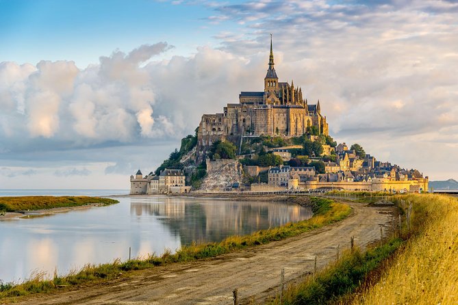 Mont Saint Michel Guided Day Trip with Abbey Entry from Paris - Free Time on the Mount: Shops, Museums, and Tidal-Wind Wandering
