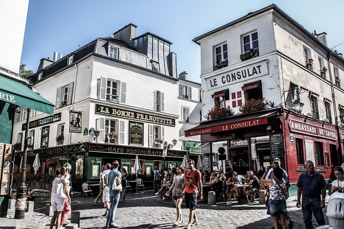 Montmartre District and Sacre Coeur - Exclusive Guided Walking Tour - Place Dalida, Jardin Sauvage de St-Vincent, and the Quiet Montmartre Corners