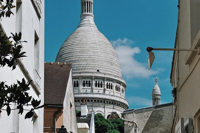 Montmartre District and Sacre Coeur - Exclusive Guided Walking Tour - Sacré-Cœur: The Photo View, Plus Inside Time