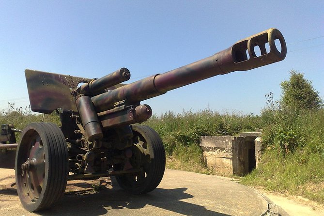 Normandy D-Day Landing Beaches Guided Tour from Paris by minivan - Pointe du Hoc: preserved bunkers, bomb craters, and sea views