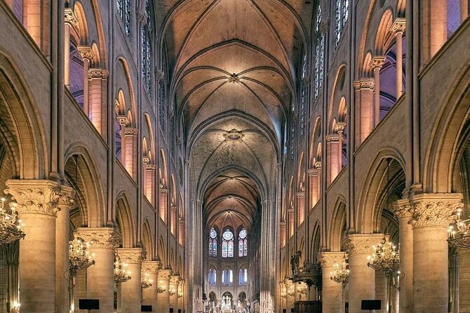 Notre Dame Mystery and Latin Quarter Walking Tour - Notre-Dame Cathedral: free access, Gothic building basics, and the 2019 fire