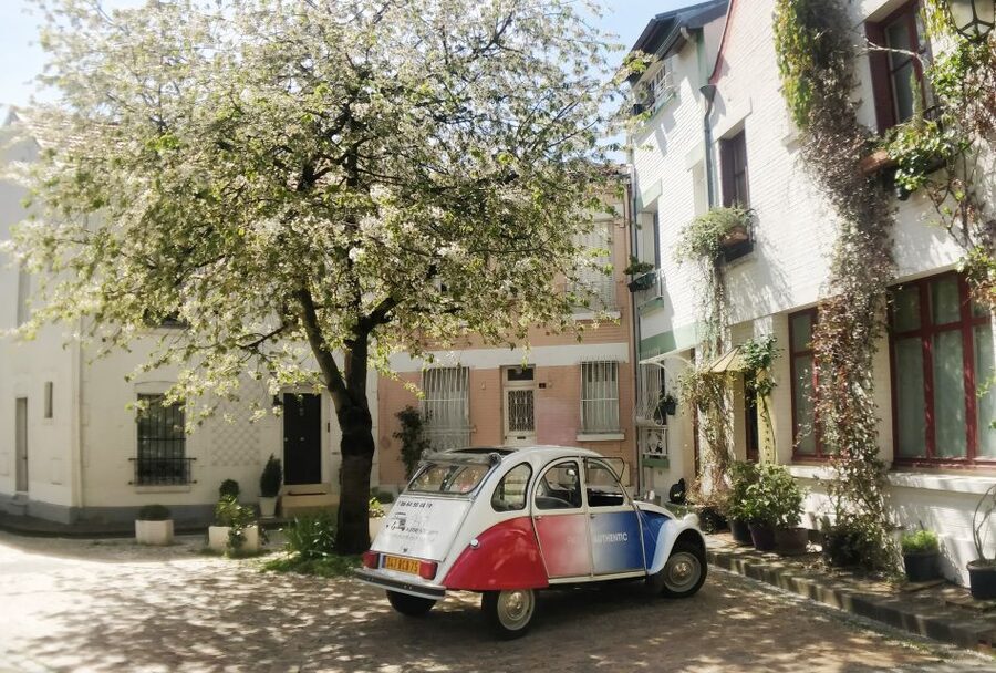 Off-the-Beaten Track in Paris: 2-Hour Vintage 2CV Tour - Place des Vosges and the Marais, where Paris slows down