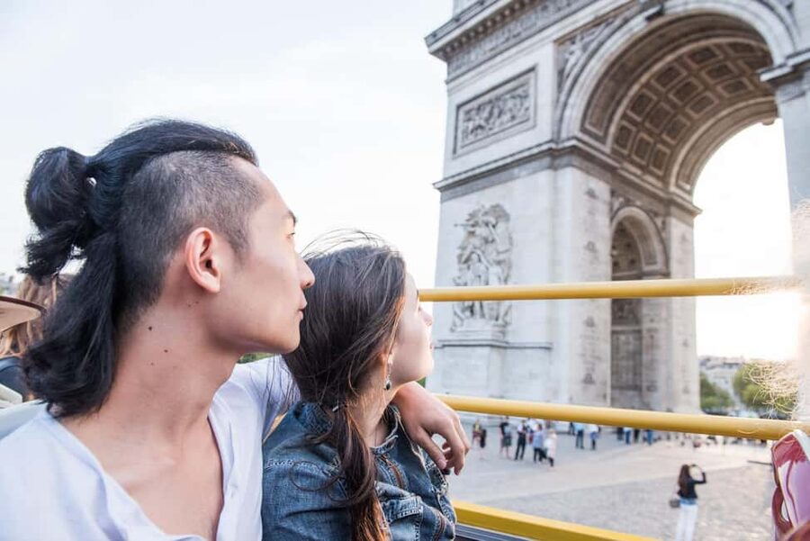 Paris: Arc de Triomphe Ticket & Big Bus Hop-on Hop-off Tour - Audio commentary and headphones: making the bus feel like a lesson