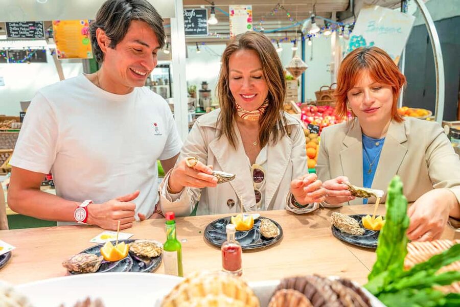 Paris: Champagne and Oysters Food Tour - Oldest Covered Market Stop: Cheese, Jam, and Cider the Paris Way
