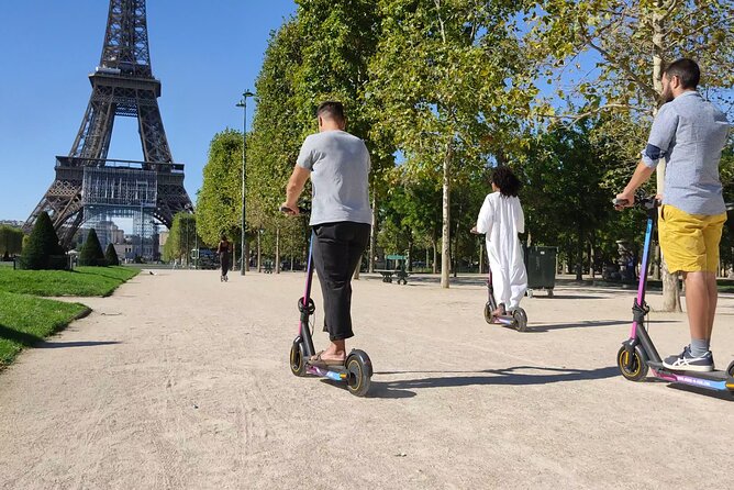 Paris City Tour by E-Scooter with Fun Guide (Small groups) - Tuileries pass: a quick breath between major monuments