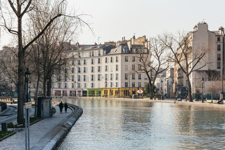 Paris: Cruise on the Saint-Martin Canal and Seine River - Canal Saint-Martin: pedestrian bridges, chestnut trees, and the Hotel du Nord