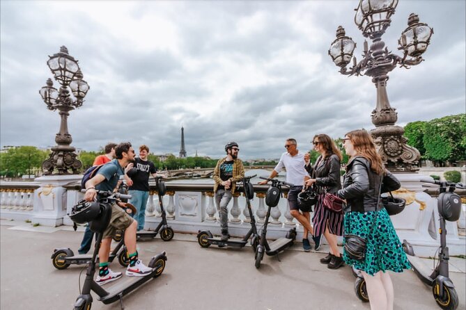 Paris E-Scooter Tour with fun & informative guide (small groups) - Louvre glass pyramid views without the museum day