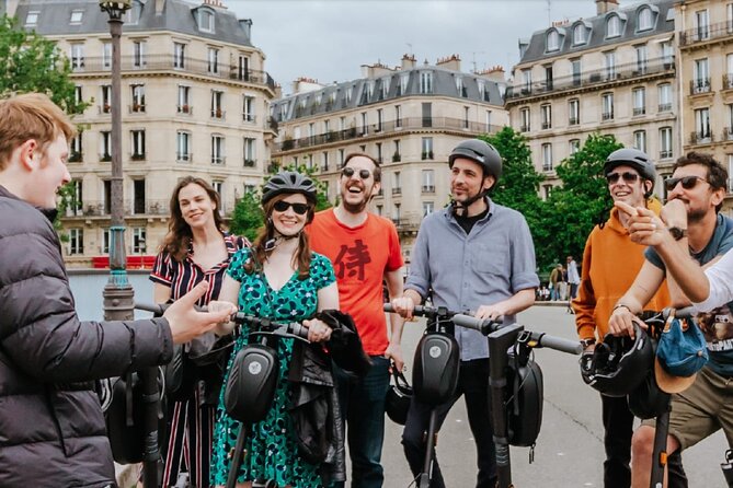 Paris E-Scooter Tour with fun & informative guide (small groups) - Le Marais pit stop: restroom and a quick snack reset