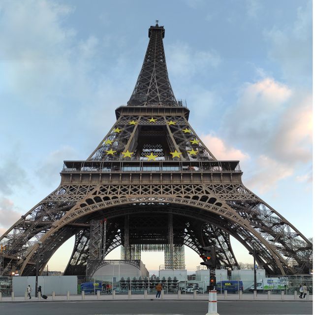 Paris: Eiffel Tower Entry Ticket with Optional Summit Access - Meeting Point at Le Champ de Mars Cafe, Tickets Are Handed Out There