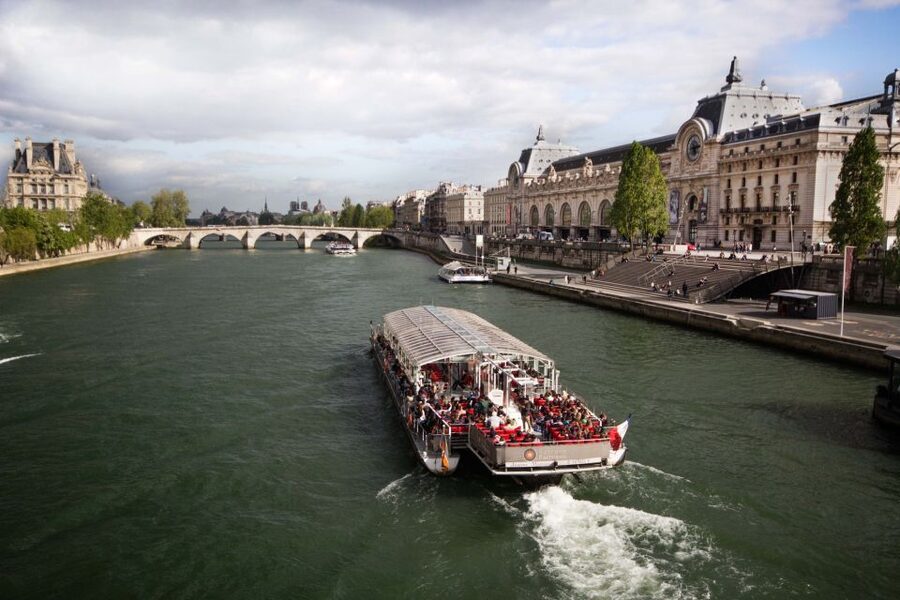 Paris: Eiffel Tower Hosted Tour, Seine Cruise and City Tour - The Seine Cruise on a Glass-Enclosed Trimaran: One Hour of Paris From Water Level