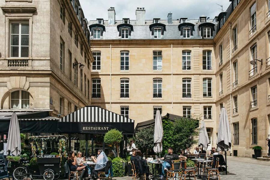 Paris: Emily TV Show Locations Guided Walking Tour - Place de Valois and the Nearby Courtyards: Where Paris Looks Like It Did