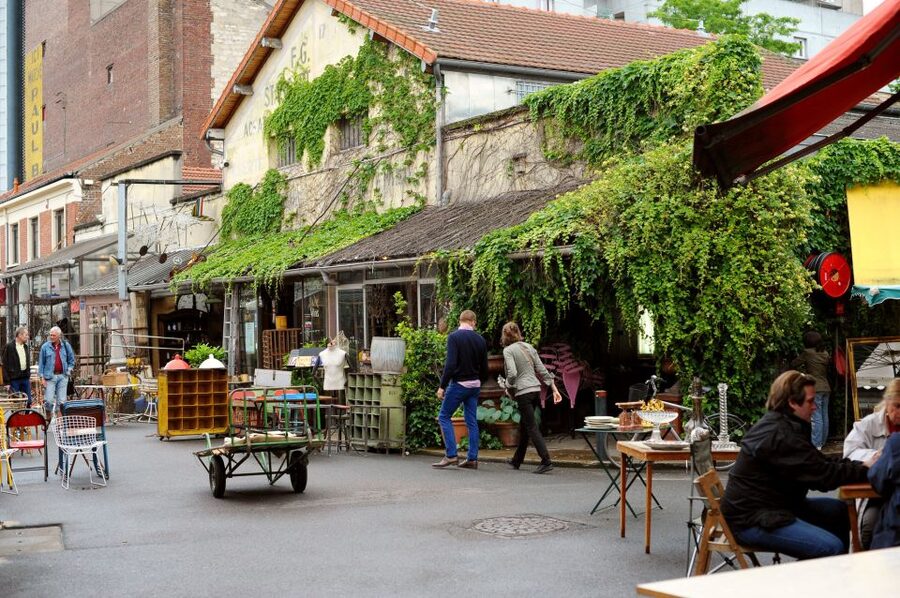 Paris: Flea Market Insider's Tour in Extra-Small Group - Traditional village stop: learning flea market culture (not just transactions)
