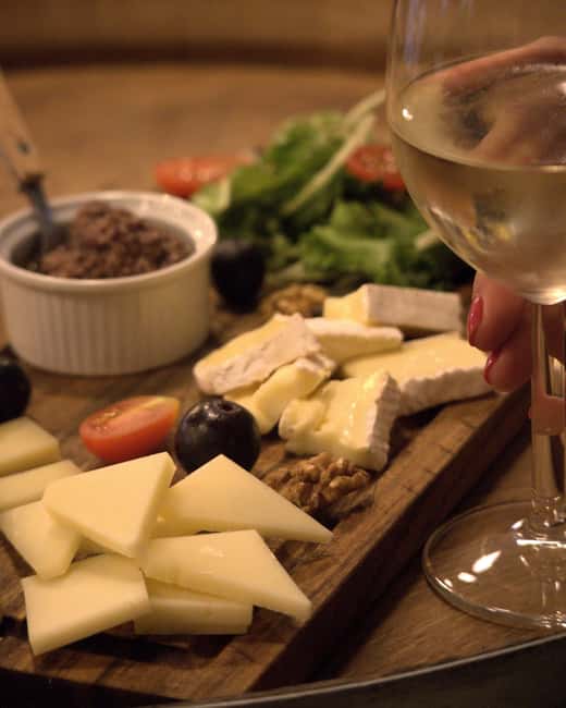 Paris: French wine tasting with cheeses and charcuterie - La Cave du Canal, a cellar bar you can find fast