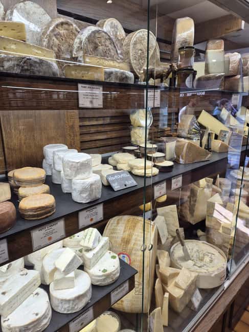Paris Gourmet: Food Tour in South Montmartre - Wine store stop: cold cuts and a glass that feels very French