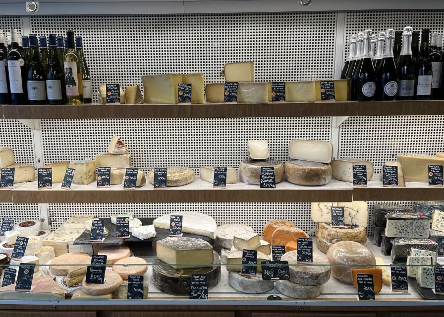 Paris: Guided Champagne & Food Tour in St-Germain-des-Pres - A local cellar pairing, where champagne becomes understandable