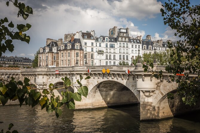 Paris History Walk: Medieval Marais, Notre Dame Islands & Stories - Île Saint-Louis: quieter quays, classic mansions, local rhythm