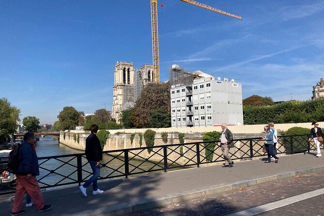 Paris: Île de la Cité and Notre-Dame Walking Tour With Crypt - Tour de l’Horloge and the oldest clock in Paris