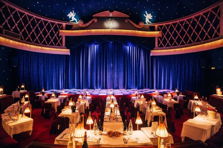 Paris: La Nouvelle Eve Cabaret Show with Champagne - Pre-show vibes: Champagne, anticipation, and getting seated