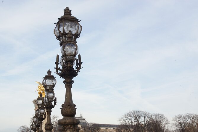 Paris Le Marais Historical Walking Tour with Wine and Cheese Tasting - Pont Marie and the Seine stroll, with likely views toward Notre-Dame