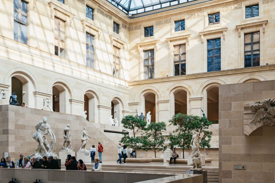 Paris: Louvre Museum Entry Ticket With Host and River Cruise - Louvre entry begins at Benlux Duty Free, 174 Rue de Rivoli