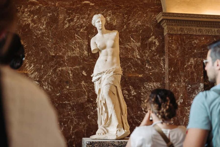 Paris: Louvre or Orsay, Eiffel Tower, City Walk & Cruise - Sainte-Chapelle and the Latin Quarter lead-in to Eiffel Tower views