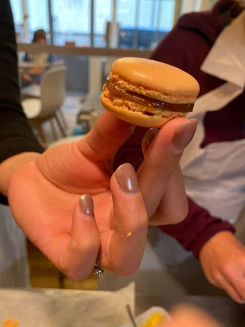 Paris: Macaron Baking Class for Families and Kids - Inside the atelier: setup, aprons, and how the class starts
