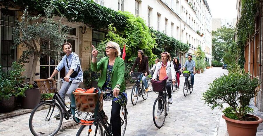 Paris Marais Bike Tour with Cheese & Sweet Tastings - Paris on a bike with cheese in your basket