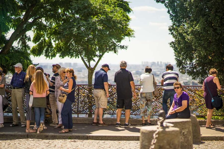 Paris Montmartre: 2-Hour City Tour in German - Lapin Agile: A Cabaret Stop That Feels Like a Story in Motion
