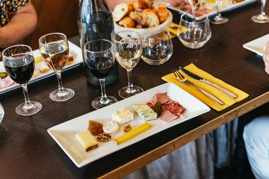 Paris: Montmartre Cheese, Wine & Pastry Guided Walking Tour - Eight Stops of Real French Eating, From Cheese to Chocolate