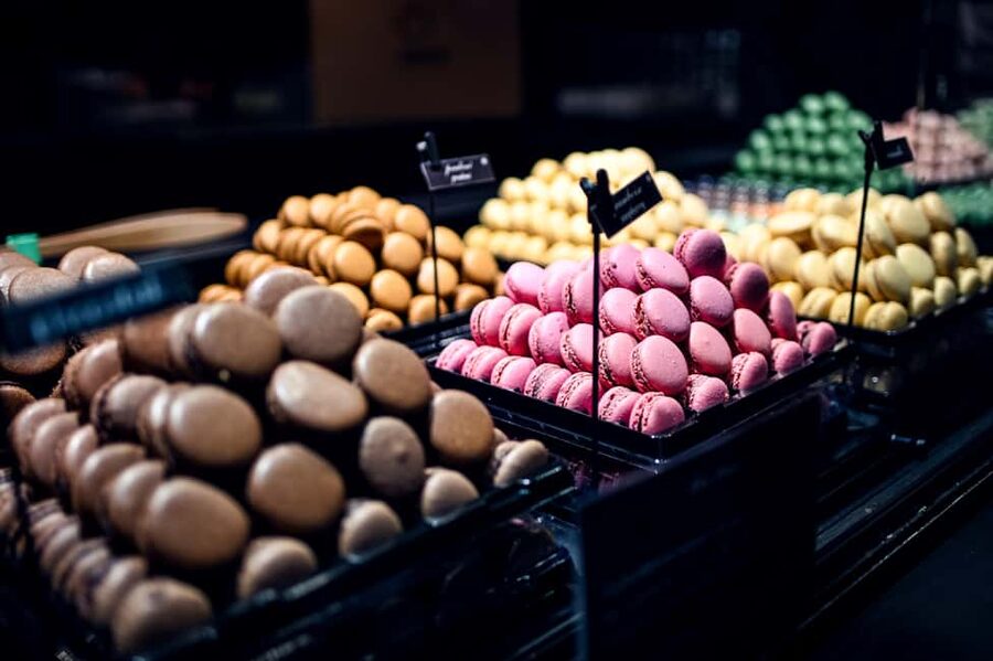Paris: Montmartre Food Tour with 10 Local Tastings & Wines - Sweet kickoff: artisan chocolates and real macarons