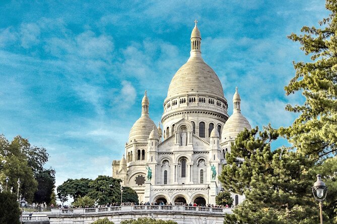 Paris Montmartre Free Walking Tour in English - Key takeaways