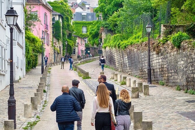 Paris Montmartre Free Walking Tour in English - Moulin Rouge and the Can-Can story that explains the neighborhood