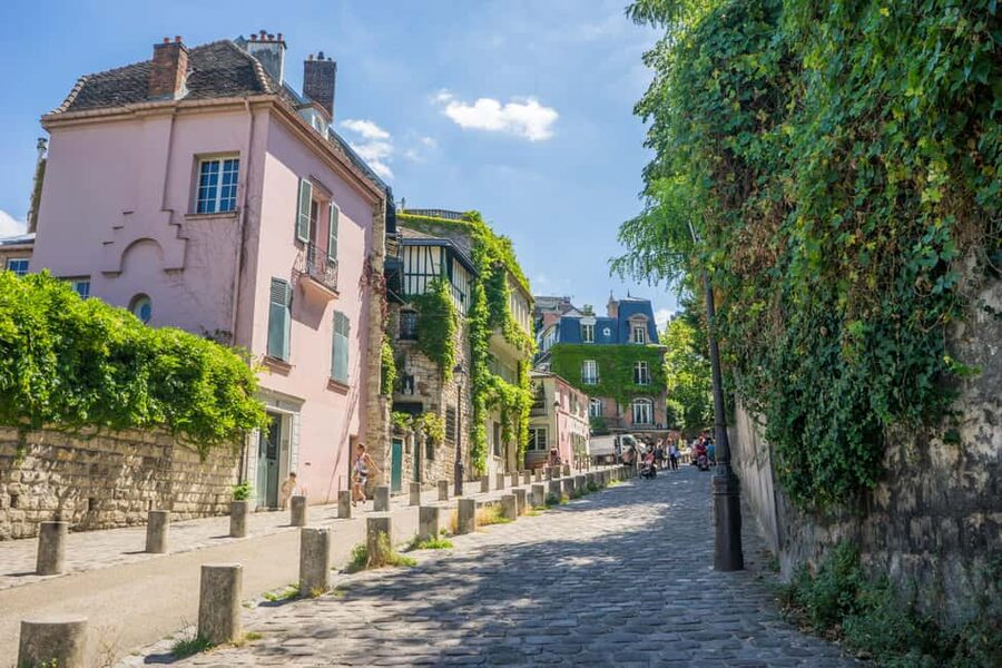 Paris: Montmartre Group Tour in German - Moulin de la Galette and La Maison Rose: where the “village” feel takes over