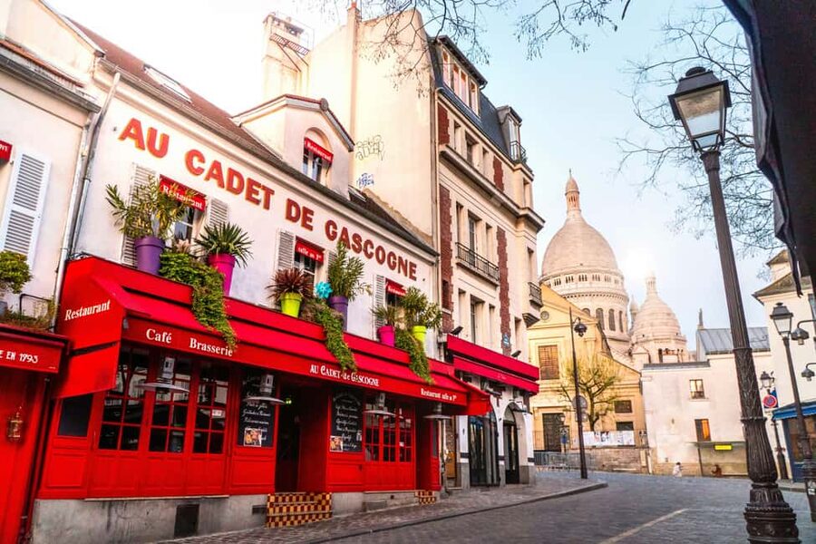 Paris: Montmartre Hidden Gems and Highlights Walking Tour - Moulin de la Galette and the Renoir connection you’ll actually understand