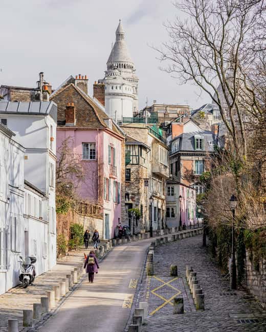 Paris: Montmartre Hidden Gems and Highlights Walking Tour - Rue des Abbesses and the rhythm of Montmartre streets