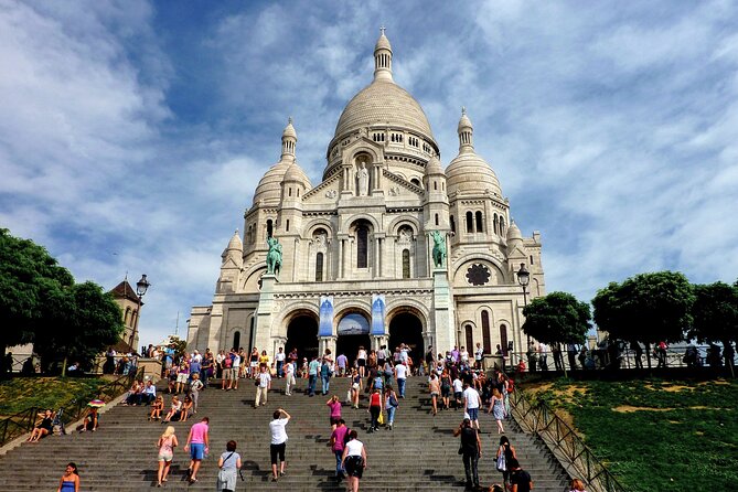 Paris Montmartre Private Walking Tour - Best Art, Culture, Food - Dalida’s bronze bust, the pink café house, and Montmartre wine history