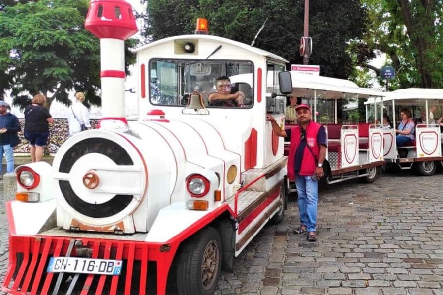 Paris: Montmartre Train Ride w/ Optional Seine River Cruise - Sacré-Cœur, Saint-Pierre Church, and the classic façades you’ll want to shoot