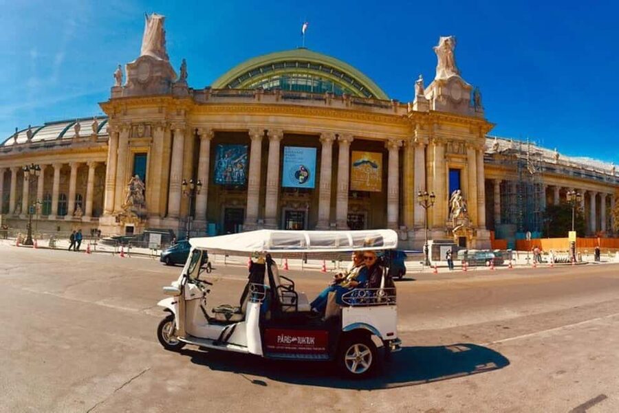 Paris: Most Iconic Monuments Guided Tour by Tuk Tuk - Champs Elysées and the Arc de Triomphe, Paris in full parade mode